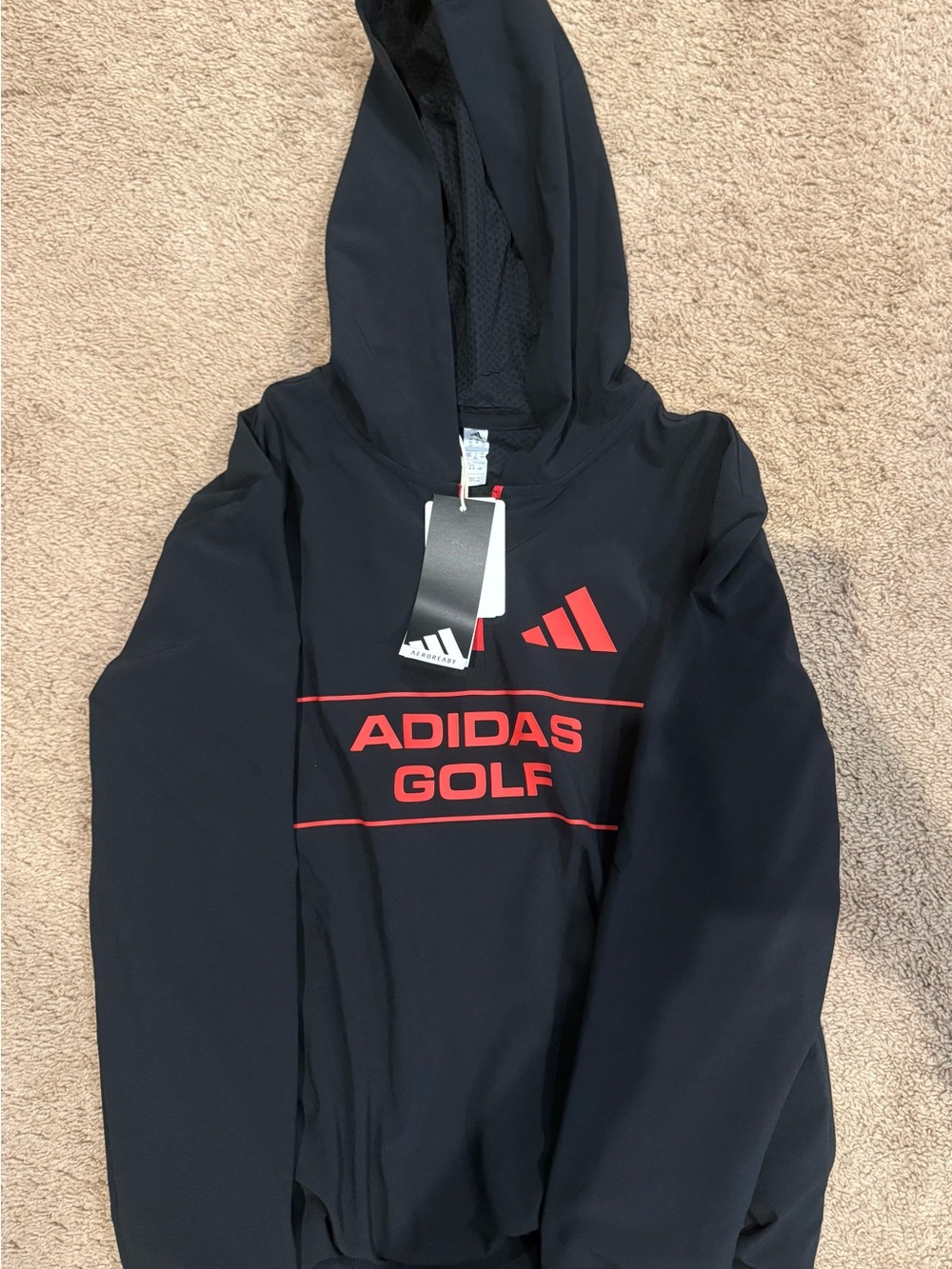 Adidas Junior AEROREADY Golf Graphics hoodie in black with bold red